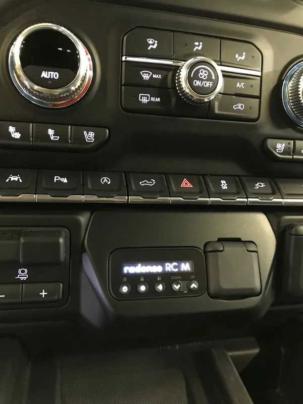 Radenso radar detector control integrated into a GMC truck dash
